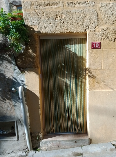 Rideau Ibiza vert métal et sable à lanière torsadée